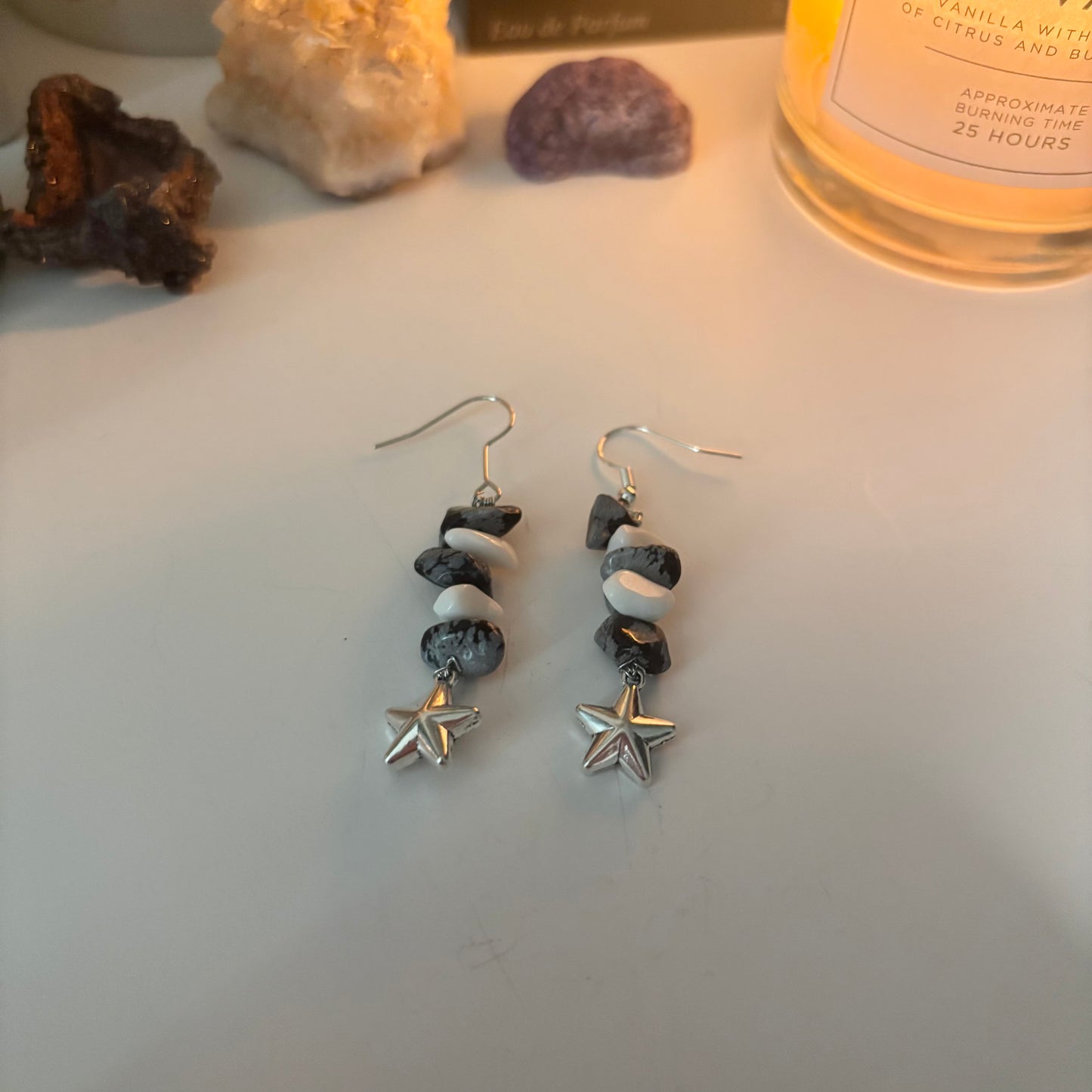 mono star dangly earrings