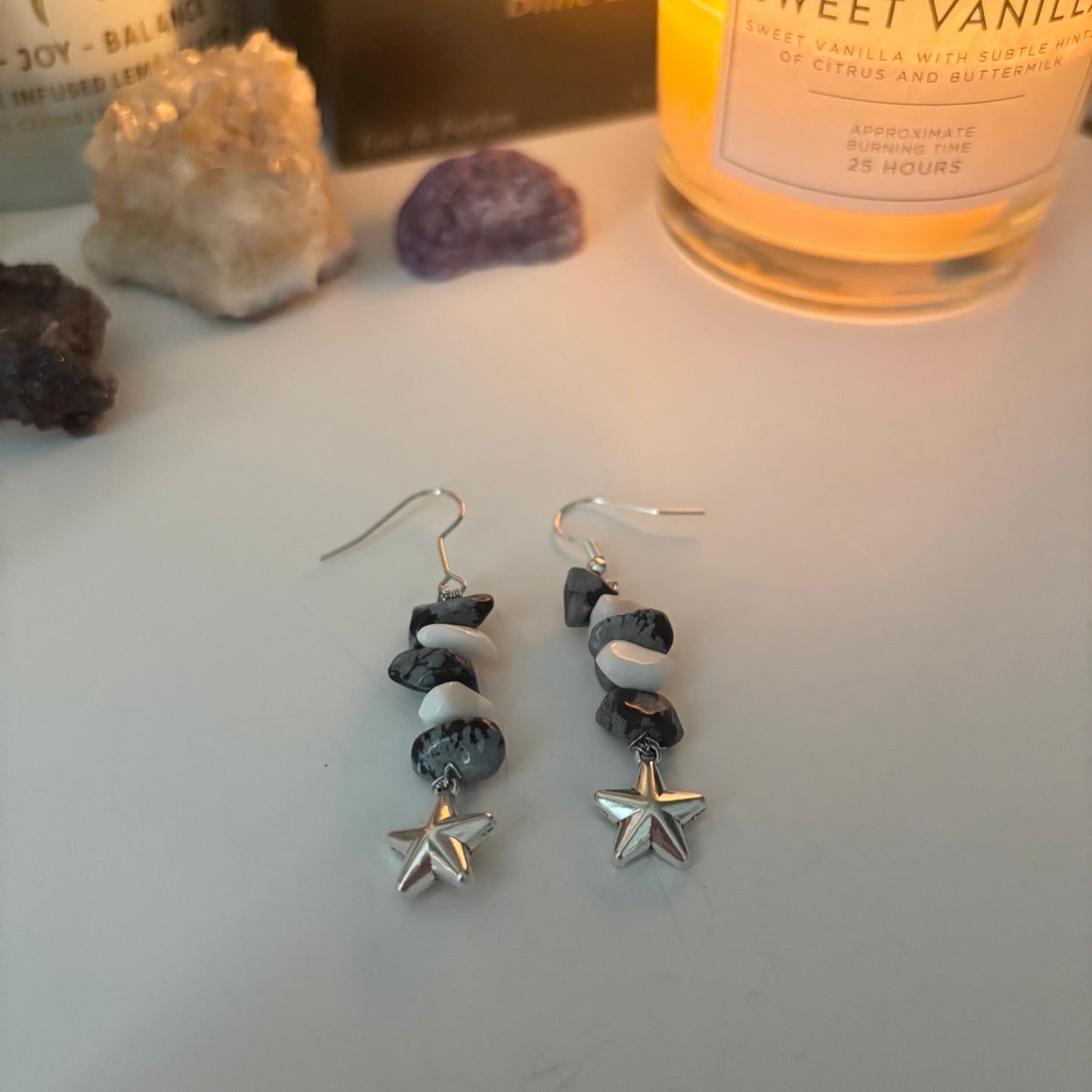 mono star dangly earrings
